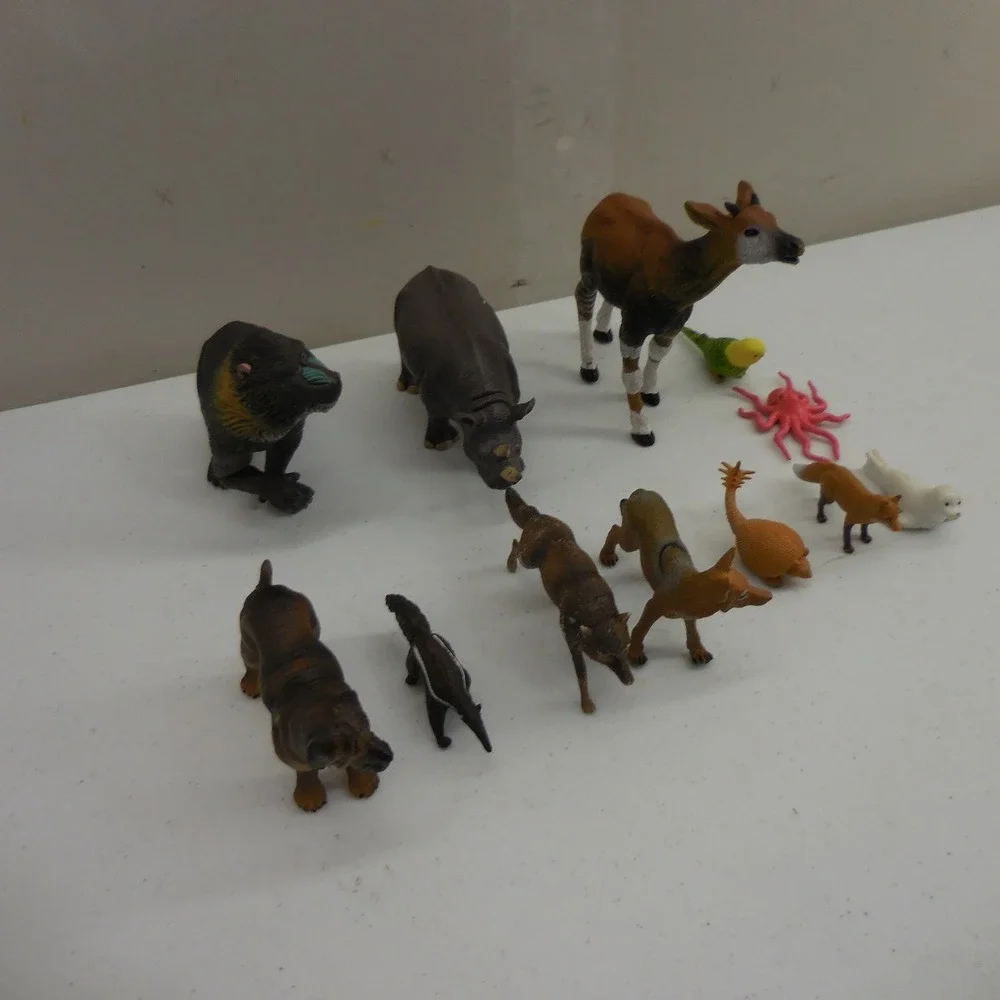 Mixed Lot 11‎ Plastic Toy Animal Figures Rhino Okapi Mandrill Wolf Dog Skunk Fox